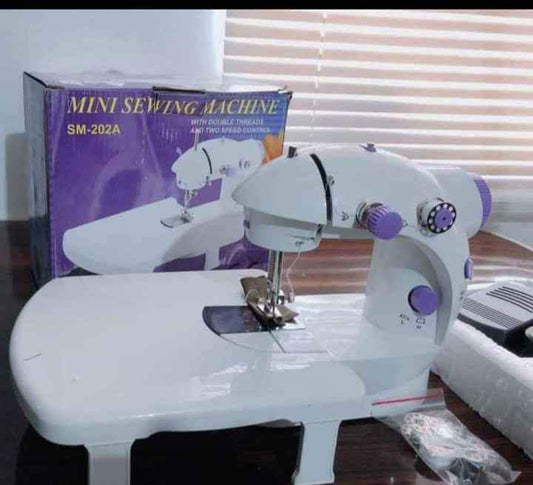 🧵 Mini Máquina de Coser Portátil